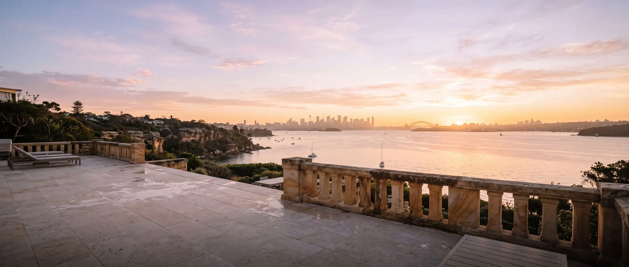 Clean limestone terrace overlooking Sydney Harbour at golden hour