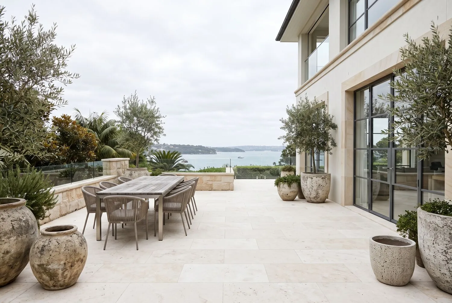 Freshly cleaned limestone courtyard with harbour views